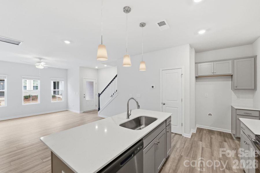 Kitchen with Quartz Countertops and soft-close cabinet doors