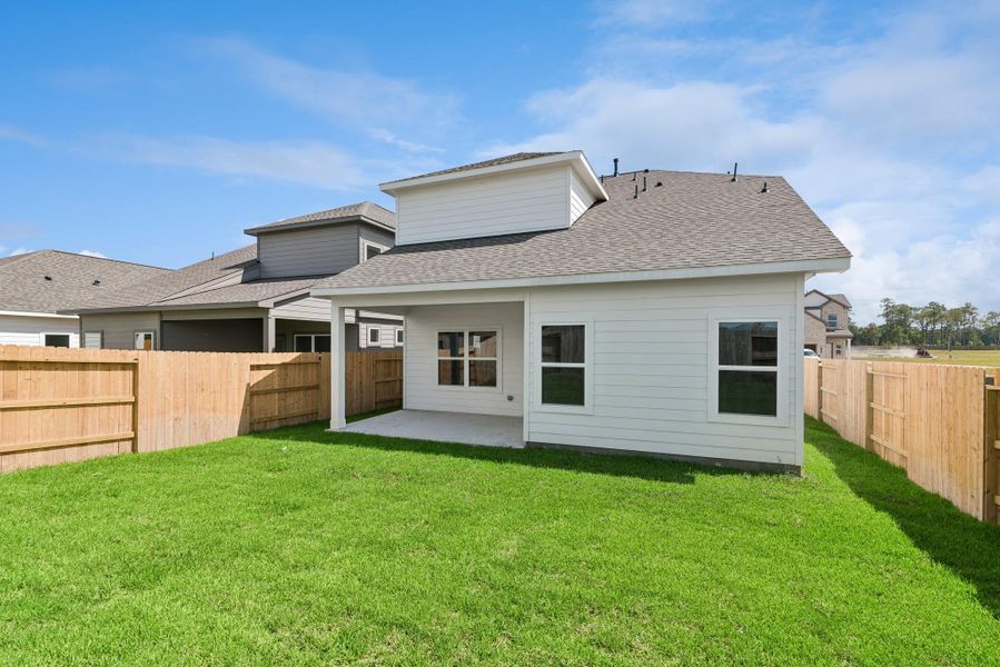 Exterior details and patio area of a home in The Canopies, Splendora (Image 18). Exterior details and patio area of a home in The Canopies, Splendora (Image 18).