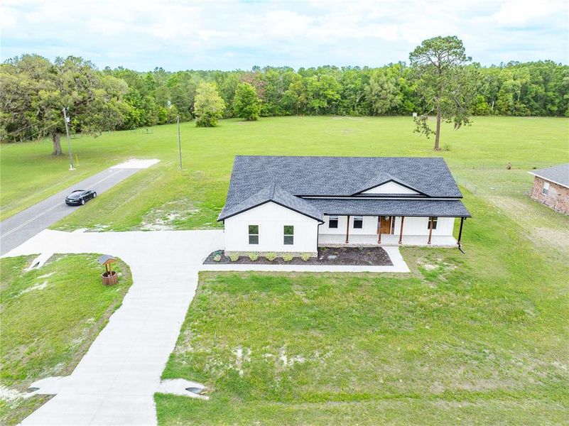 Front exterior of a new home in , Lake City, FL, highlighting curb appeal (Image 25).