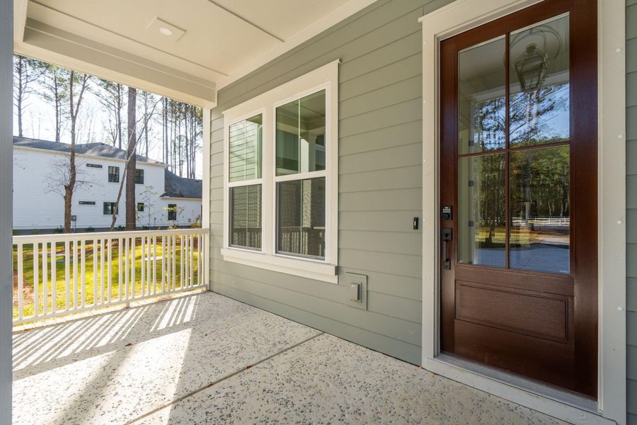 Exterior details and patio area of a home in , Awendaw (Image 35).