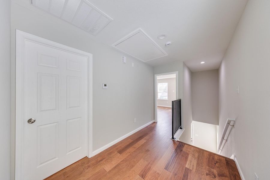 The second floor offers a well-thought-out layout, featuring spacious bedrooms, a full bathroom, and a versatile game room or loft area. This smart design ensures privacy while providing plenty of room for relaxation, work, or play, making it perfect for family living.