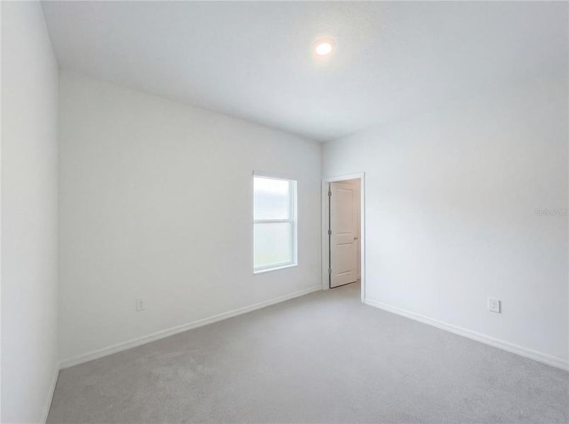 Spacious, unfurnished interior of a new home in Grand Park, Dunnellon (Image 18).
