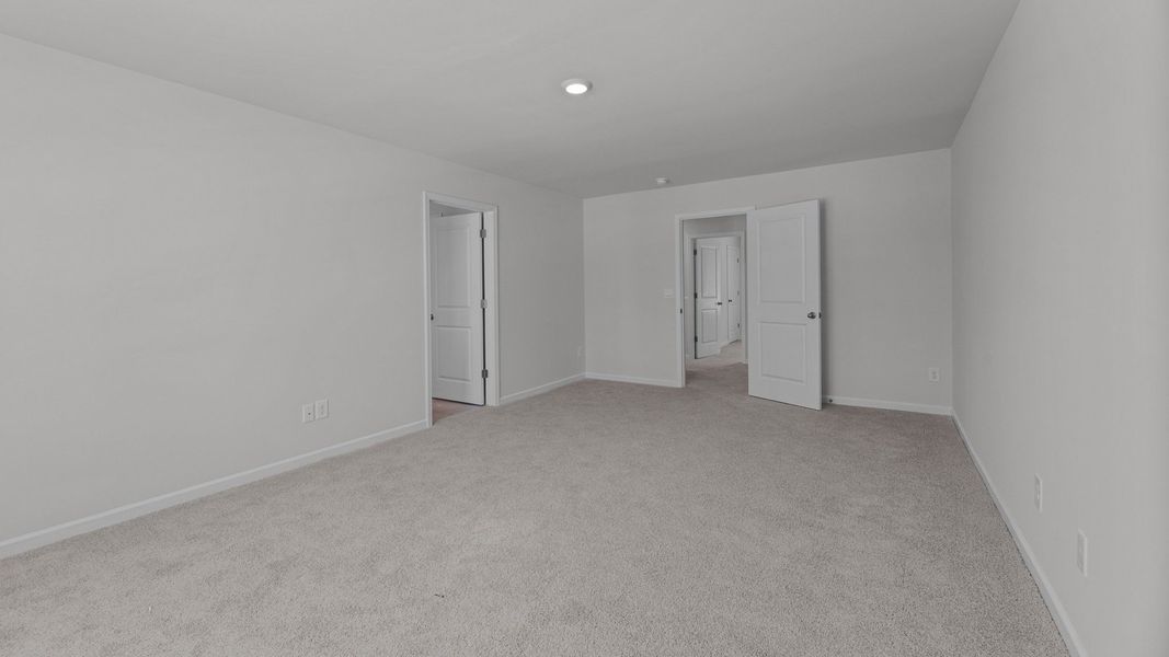 Spacious, unfurnished interior of a new home in Beaver Dam Crossing, Bailey (Image 17). Spacious, unfurnished interior of a new home in Beaver Dam Crossing, Bailey (Image 17).