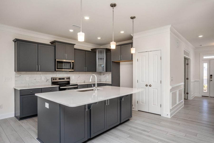 Furnished interior view inside a new home in 1158 Place, Wilson (Image 9).