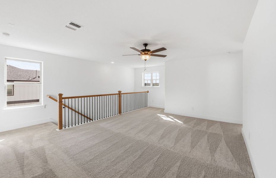 Spacious, unfurnished interior of a new home in Saddleback at Santa Rita Ranch, Liberty Hill (Image 43).