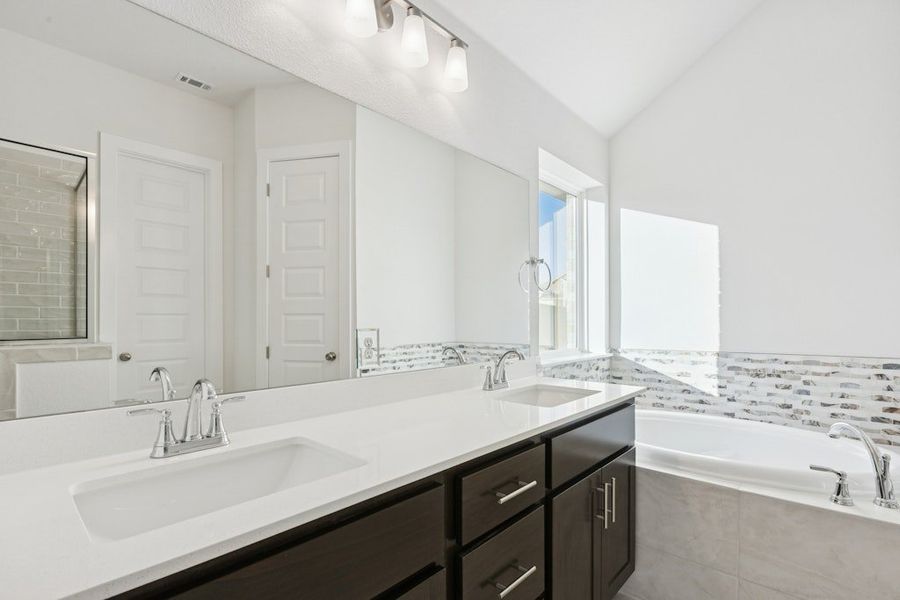 Furnished interior view inside a new home in The Colony, Bastrop (Image 11).