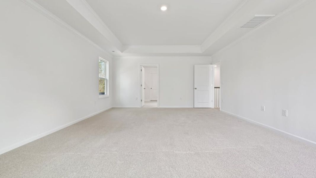 Representative unfurnished interior of a home built from the Wylie by D.R. Horton in Eagle Creek, Fuquay Varina (Image 31).