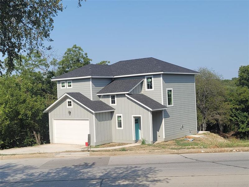 Front exterior of a new home in , Fort Worth, TX, highlighting curb appeal (Image 11).