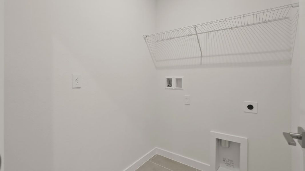 Furnished interior view inside a new home in Grasslands West, Lakeland (Image 12).