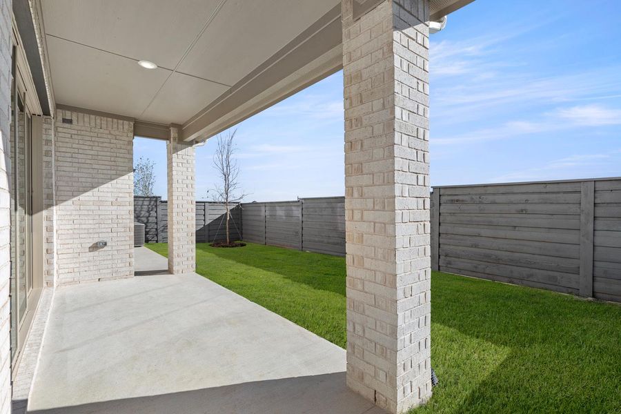 Exterior details and patio area of a home in Garden Collection at Union Park, Little Elm (Image 4).