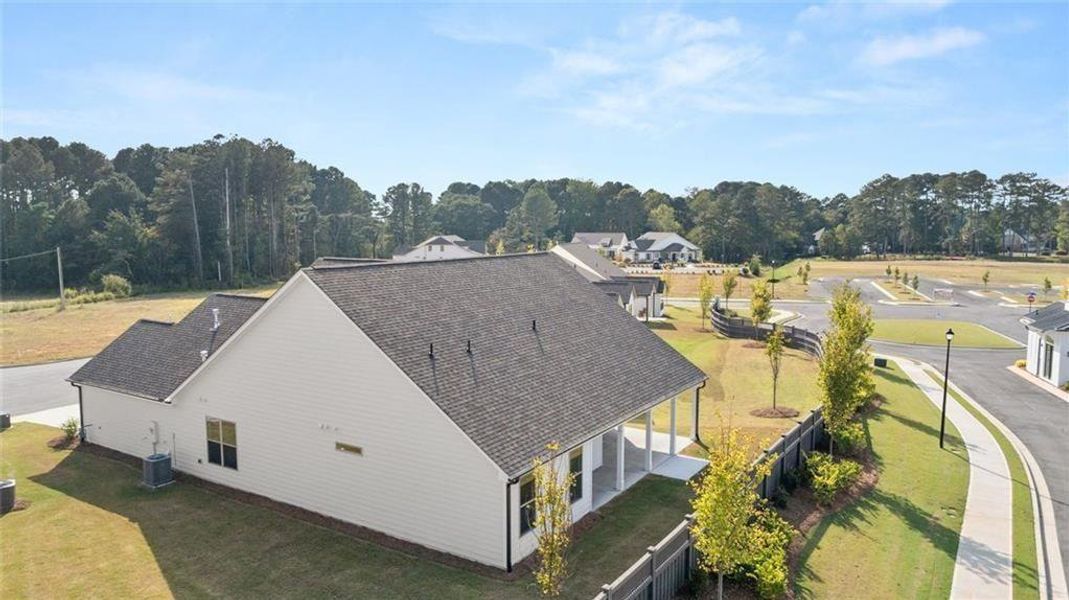Exterior details and patio area of a home in Soleil Summit Chase, Snellville (Image 30).