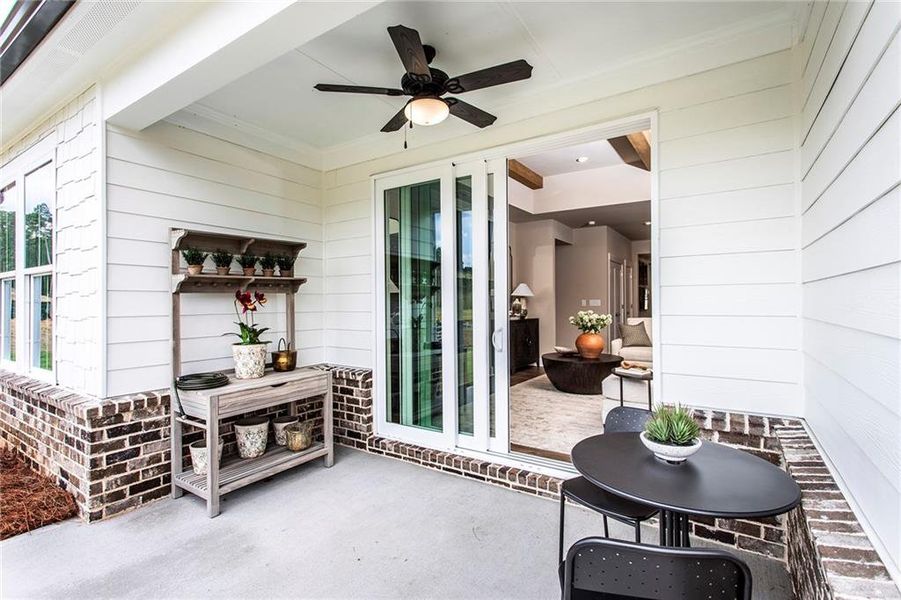 Exterior details and patio area of a home in Gatherings® at GreenHouse, Marietta (Image 2). Exterior details and patio area of a home in Gatherings® at GreenHouse, Marietta (Image 2).