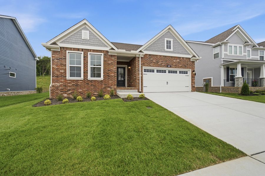 Front exterior of a new home in The Retreat at Norman Farm, Hendersonville, TN, highlighting curb appeal (Image 26). Front exterior of a new home in The Retreat at Norman Farm, Hendersonville, TN, highlighting curb appeal (Image 26).