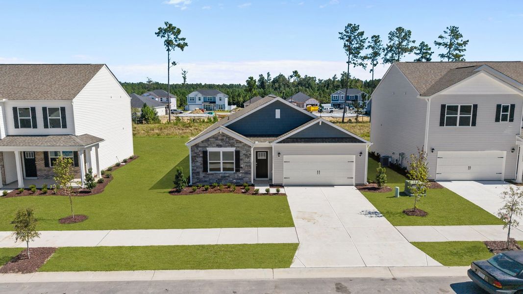 Front exterior of a new home in West New Bern, New Bern, NC, highlighting curb appeal (Image 2).