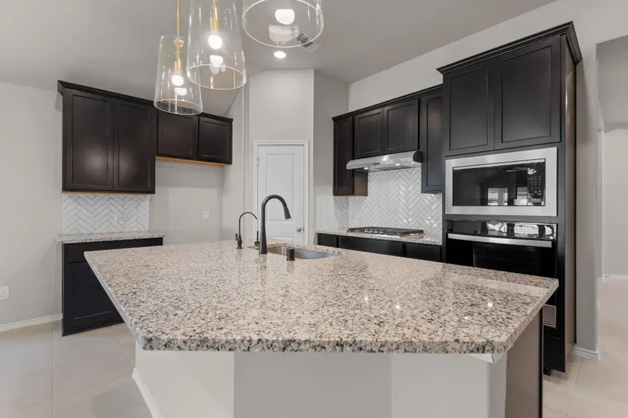 Furnished interior view inside a new home in Grand Central Park, Conroe (Image 9).