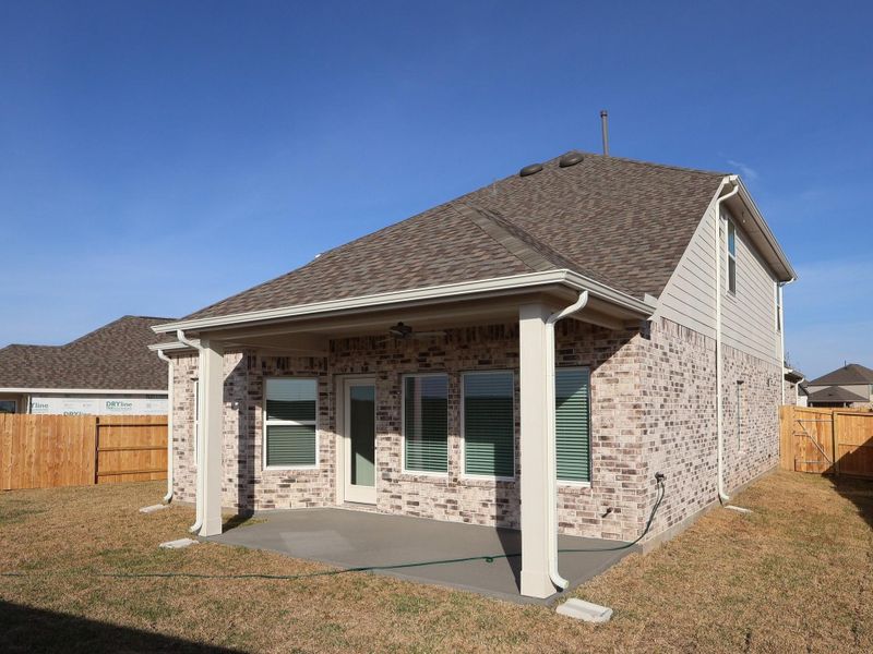 Exterior details and patio area of a home in Marvida, Cypress (Image 25).