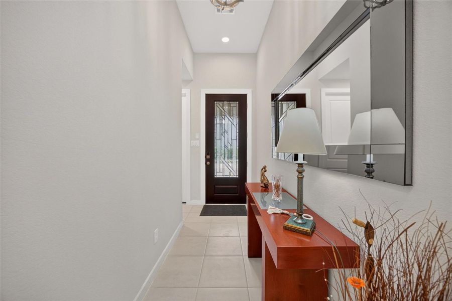 View of the front entry from the living room. View of the front entry from the living room.