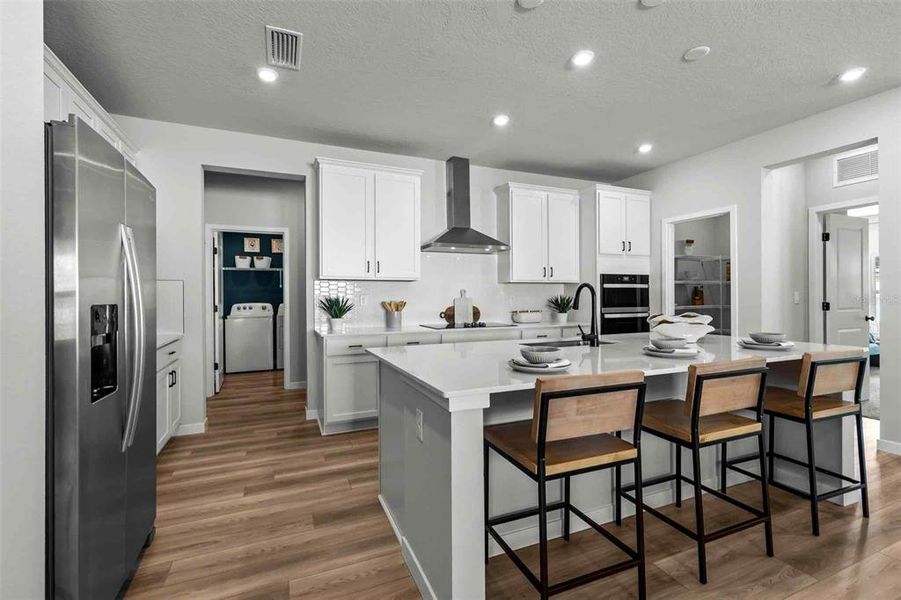 Furnished interior view inside a new home in The Cypress Series at Reserve East, Flagler Beach (Image 31).