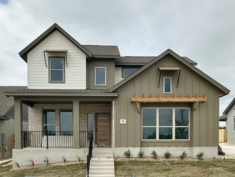 Front exterior of a new home in Sage Hollow, Kyle, TX, highlighting curb appeal (Image 3).