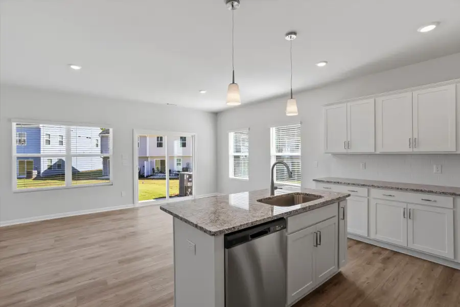 Furnished interior view inside a new home in West Main Townhomes, Sanford (Image 4).
