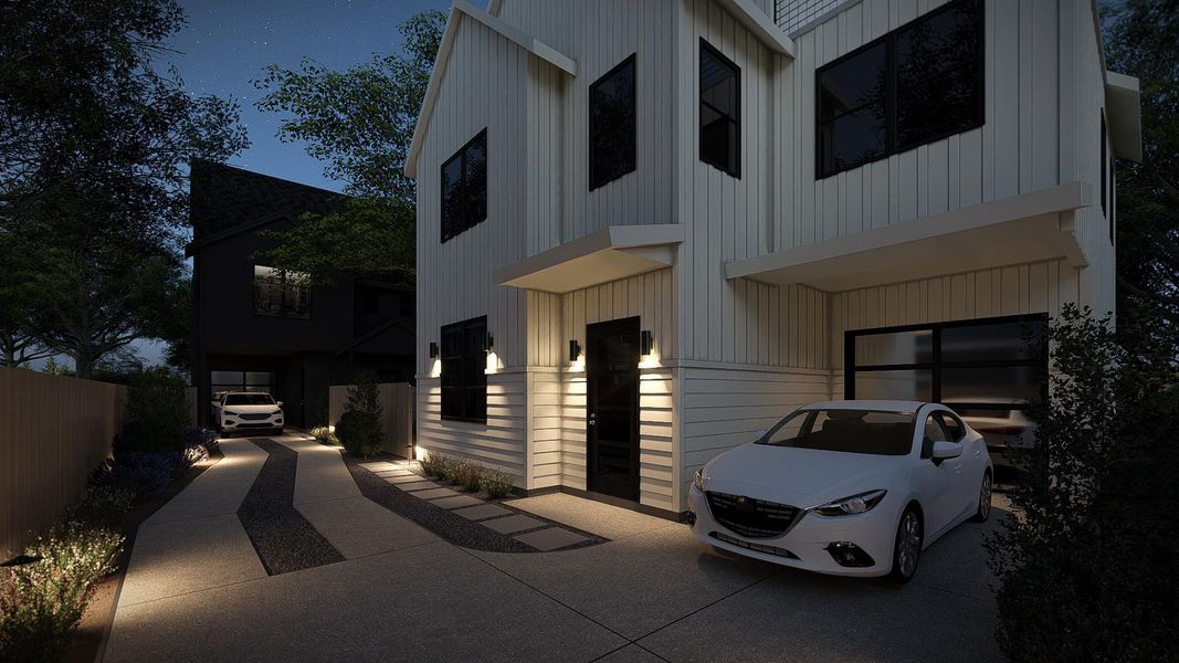 Modern architecture featuring vertical and horizontal white siding, a single-car garage, and a covered entry