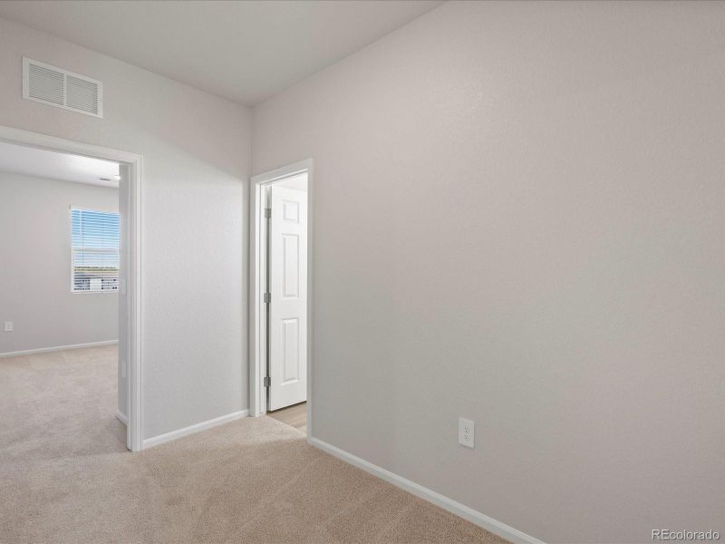 Spacious, unfurnished interior of a new home in Poudre Heights: The Alpine Collection, Windsor (Image 19).