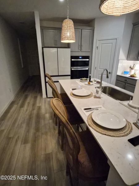 Furnished interior view inside a new home in Condo Collection at Grand Vue at Interlocken, Fernandina Beach (Image 8).