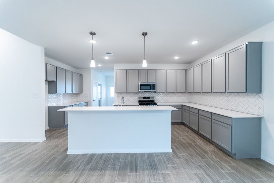 Furnished interior view inside a new home in Briarwood, Elgin (Image 3).