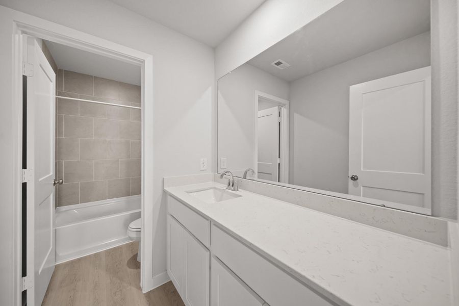 Furnished interior view inside a new home in Sunterra, Katy (Image 6). Furnished interior view inside a new home in Sunterra, Katy (Image 6).