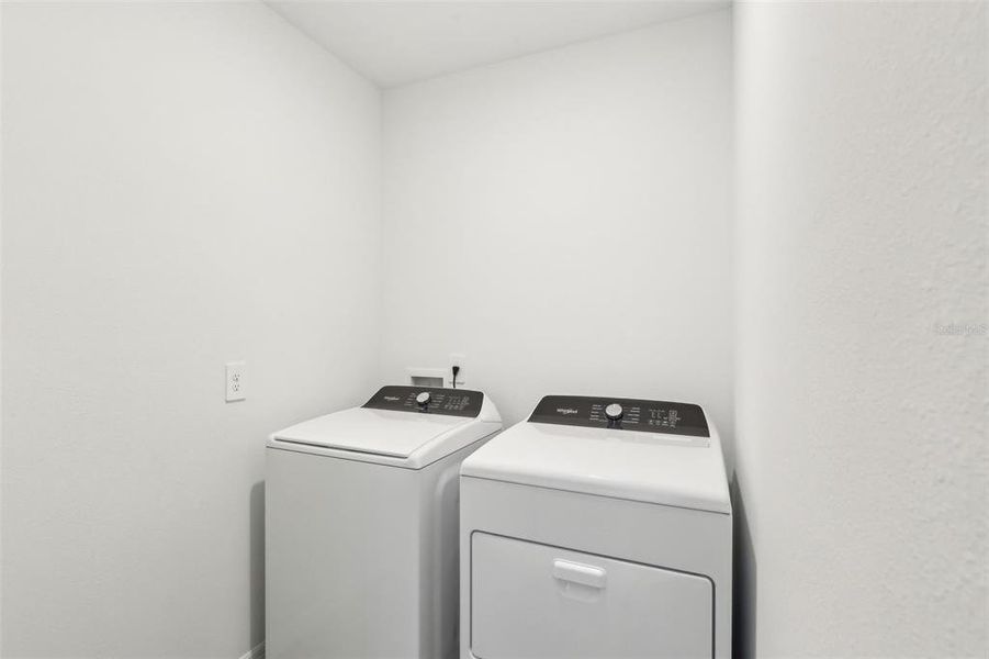 Furnished interior view inside a new home in Villamar - Classic Series, Winter Haven (Image 9). Furnished interior view inside a new home in Villamar - Classic Series, Winter Haven (Image 9).