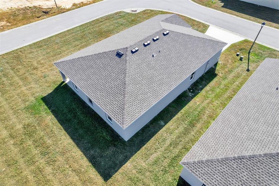 Exterior details and patio area of a home in Stone Ridge, Sebring (Image 12).