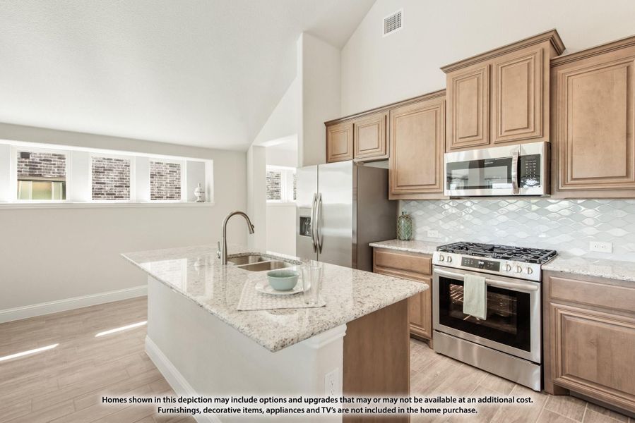 Kitchen with granite island, stainless steel appliances, wood cabinets, and decorative tile backsplash Kitchen with granite island, stainless steel appliances, wood cabinets, and decorative tile backsplash