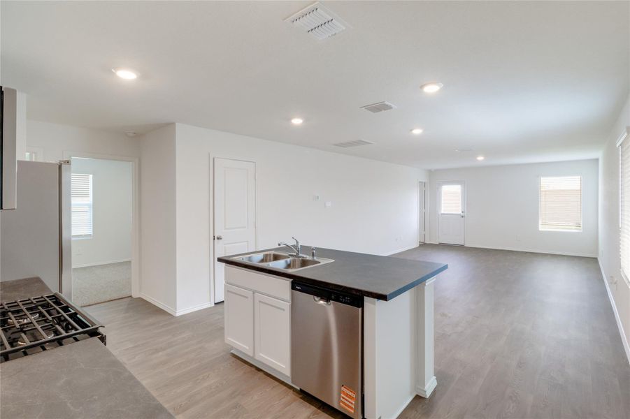 Furnished interior view inside a new home in Watermill, Uhland (Image 7).