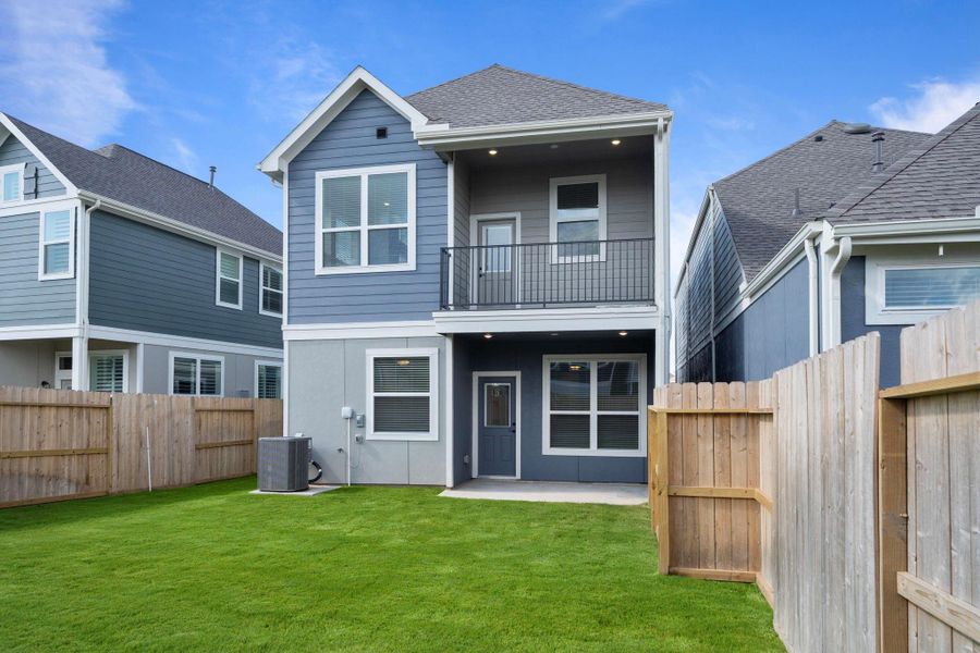 Front exterior of a new home in Sienna, Missouri City, TX, highlighting curb appeal (Image 21). Front exterior of a new home in Sienna, Missouri City, TX, highlighting curb appeal (Image 21).
