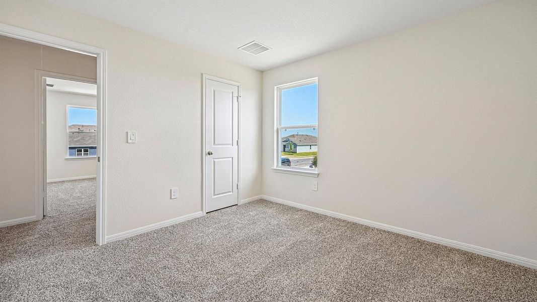 Spacious, unfurnished interior of a new home in Carillon, Manor (Image 25).