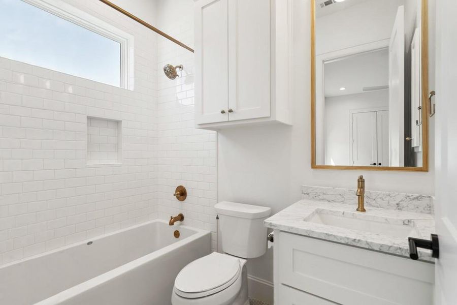 Full bathroom with vanity and tub / shower combination