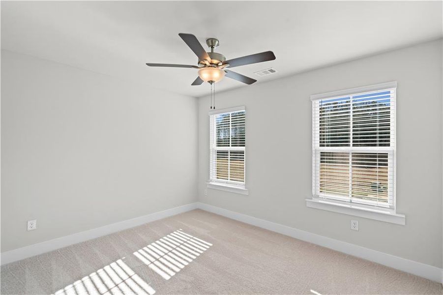 Spacious, unfurnished interior of a new home in Creekside at Skelton, Jefferson (Image 39).