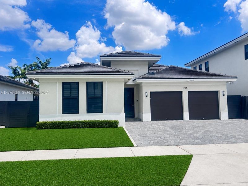 Front exterior of a new home in , Miami, FL, highlighting curb appeal (Image 1). Front exterior of a new home in , Miami, FL, highlighting curb appeal (Image 1).