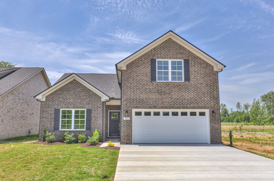 Front exterior of a new home in Legacy Preserve, Tullahoma, TN, highlighting curb appeal (Image 15). Front exterior of a new home in Legacy Preserve, Tullahoma, TN, highlighting curb appeal (Image 15).