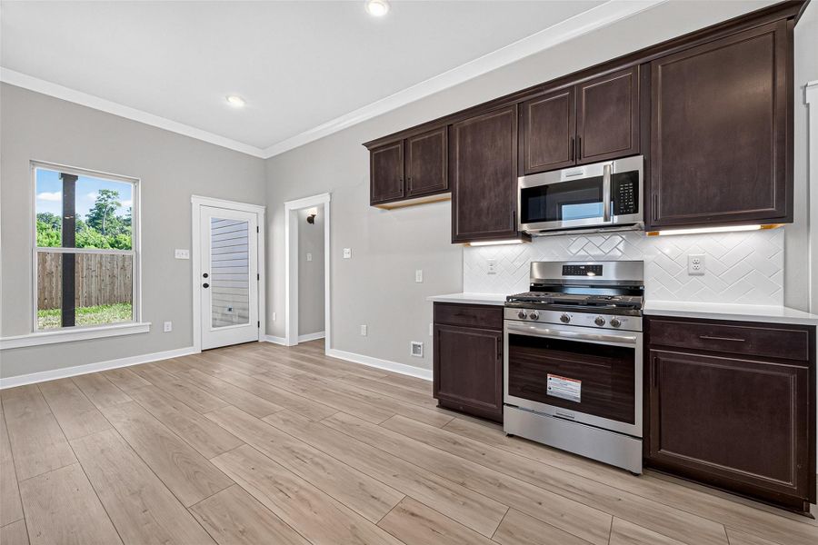 Furnished interior view inside a new home in Mostyn Springs, Magnolia (Image 10).