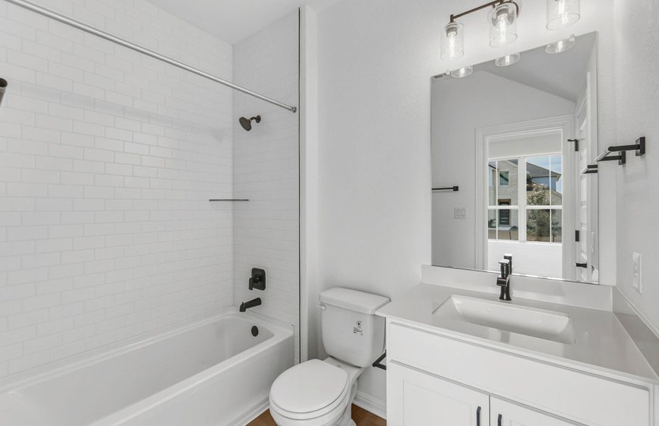 Furnished interior view inside a new home in Bluffview Reserve, Leander (Image 16).