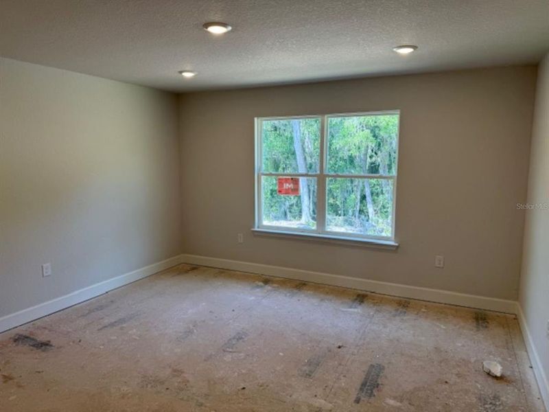 Spacious, unfurnished interior of a new home in West Oak, Ocala (Image 10).