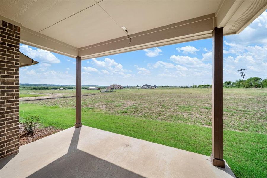 View of patio with a rural view