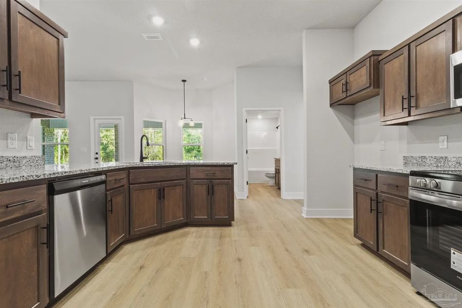 Furnished interior view inside a new home in Pecan Valley, Cantonment (Image 8).