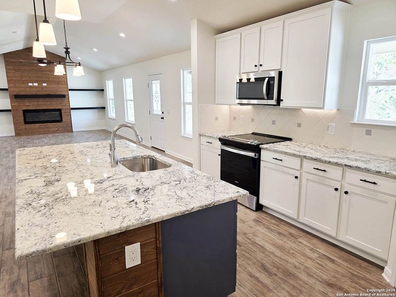 Furnished interior view inside a new home in , Fischer (Image 5).