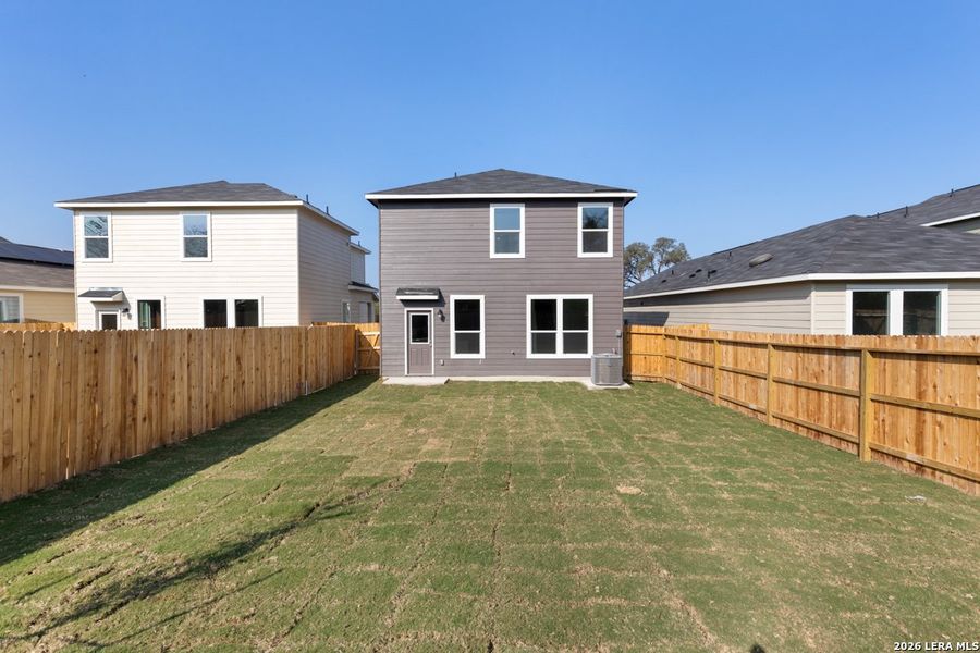 Exterior details and patio area of a home in Spanish Trails Villas, San Antonio (Image 3).