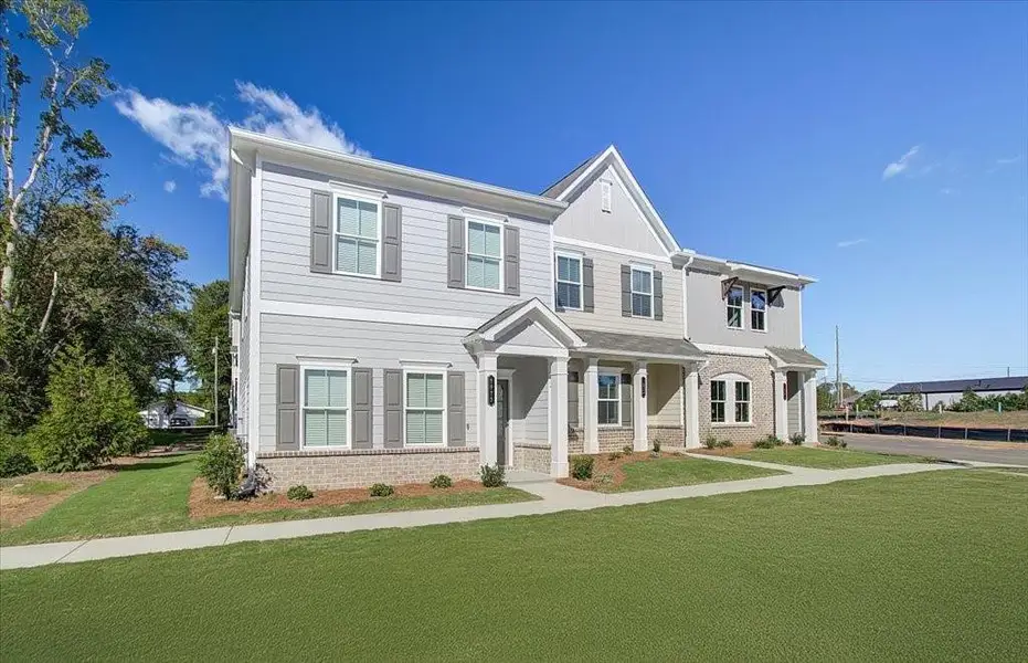 Front exterior of a new home in Wildwood Place, Powder Springs, GA, highlighting curb appeal (Image 24).