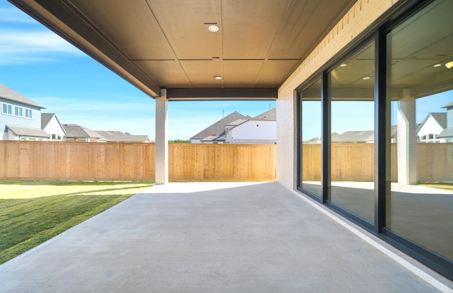 Exterior details and patio area of a home in Bridgeland 60′, Cypress (Image 22).