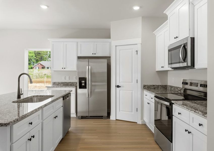 The kitchen has granite countertops