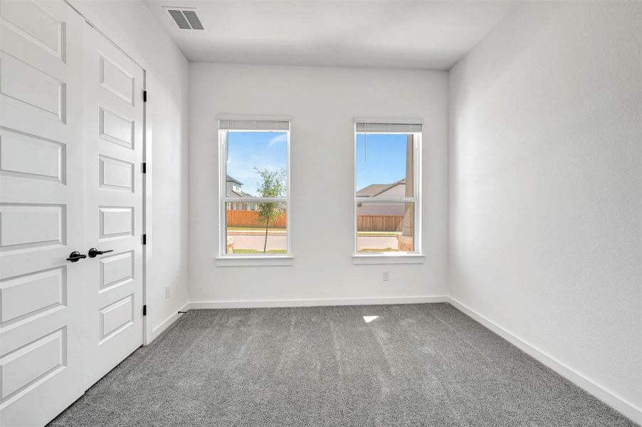 Spacious, unfurnished interior of a new home in Heritage, Dripping Springs (Image 29).